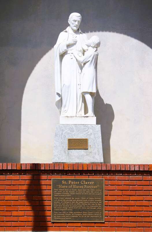 The statue of St. Peter Claver on the front of the Parish Life Center at the Cathedral of the Immaculate Conception in Lake Charles, Louisiana.