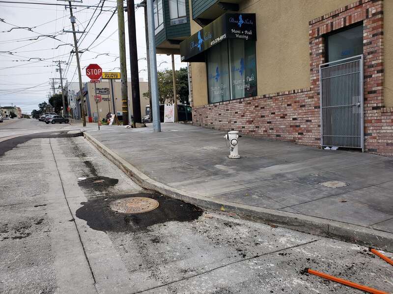 Pedestrian bulb at Taraval Street and 15th Avenue, constructed as part of the L Taraval Improvement Project, in February 2024
