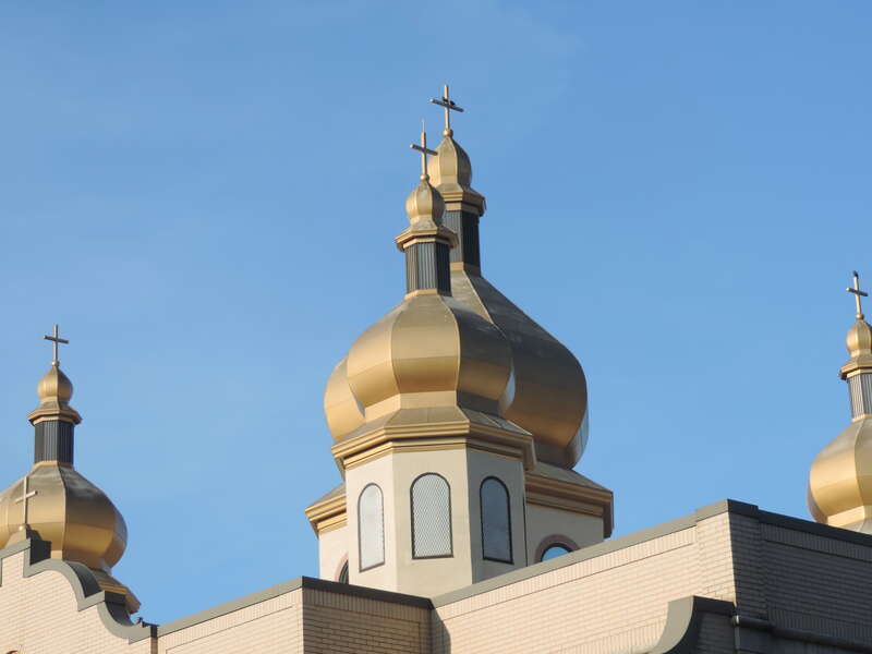 Looking north at domes of SS Peter and Paul Ukrainian Catholic Church on a sunny afternoon