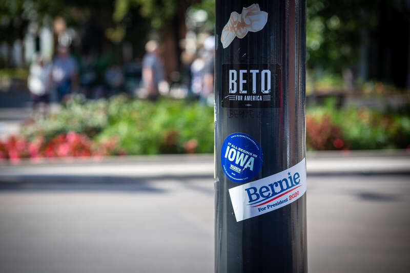 Support is split among candidates, according to the stickers on this pole in downtown Iowa City.