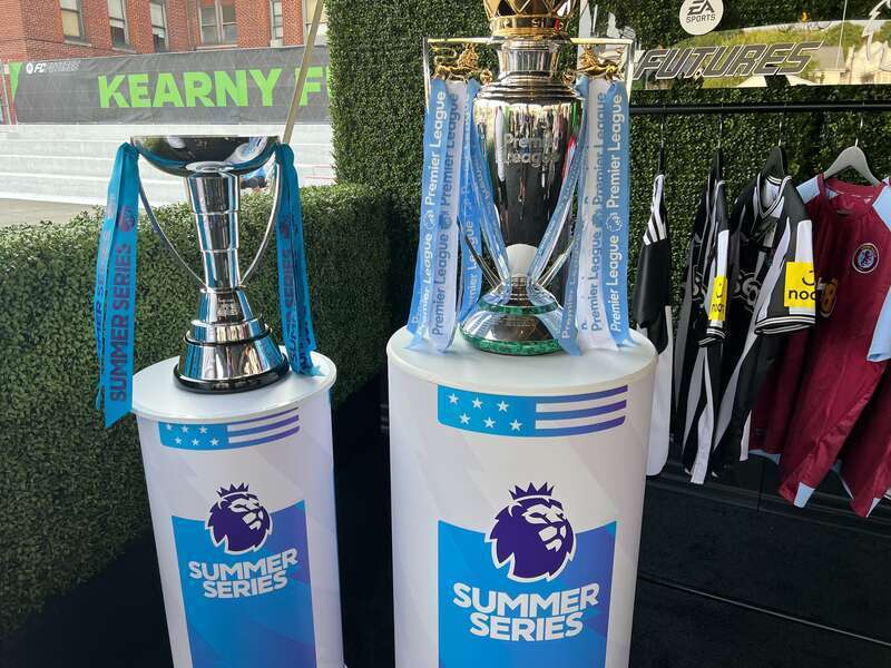 The Premier League Summer Series trophy (left) on display alongside the Premier League trophy