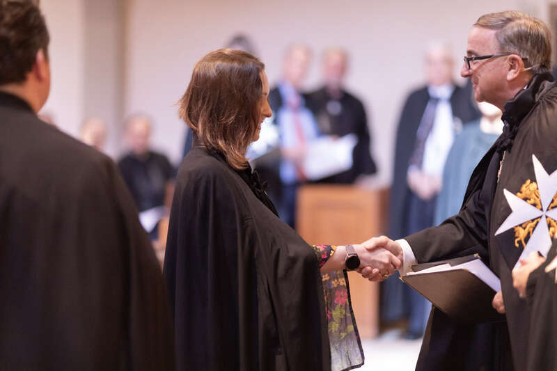 Princess Raiyah bint Al Hussein, a member of the royal family of Jordan, being invested as a Dame of Justice of the Most Venerable Order of the Hospital of Saint John of Jerusalem by Prior of the Priory in the USA, Nigel Heath, KStJ.