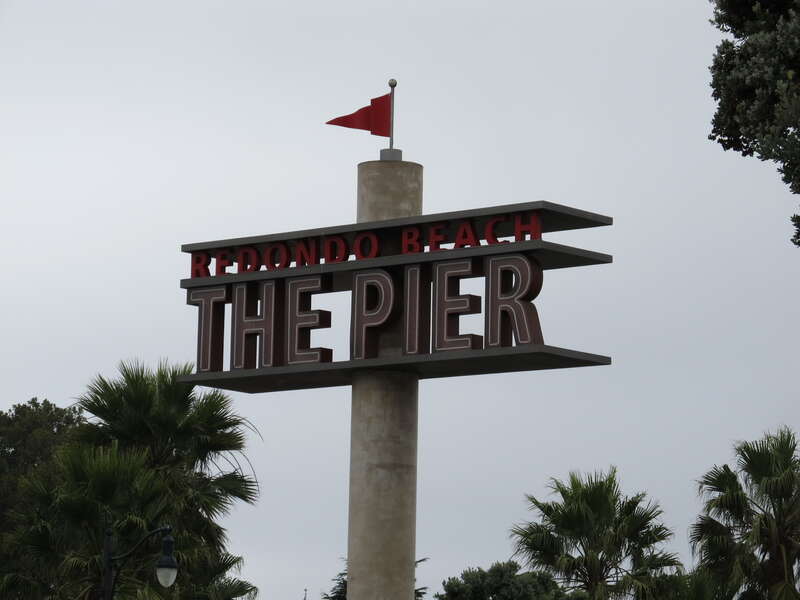 The Redondo Beach pier is located in Redondo Beach, California and stretches out onto the Pacific Ocean. The pier has been rebuilt and altered by storms and redevelopments. Its official name is &quot;Municipal Pier&quot;, and it has also been called the