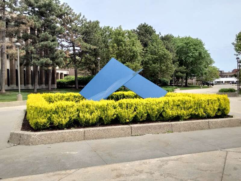 Photograph of the Robert Murray sculpture Nordkyn located on Wayne State University campus in Detroit, Michigan in May 2022.