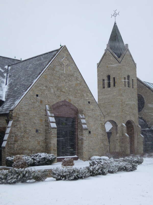 Saint Brigid Church (Dublin, OH) - exterior, parish center and church tower during a snow storm