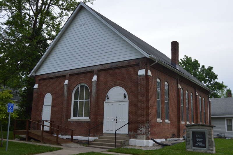 Front and eastern side of Second Baptist Church, located at 400 W. Madison Street in Franklin, Indiana, United States.  It was built in 1852.