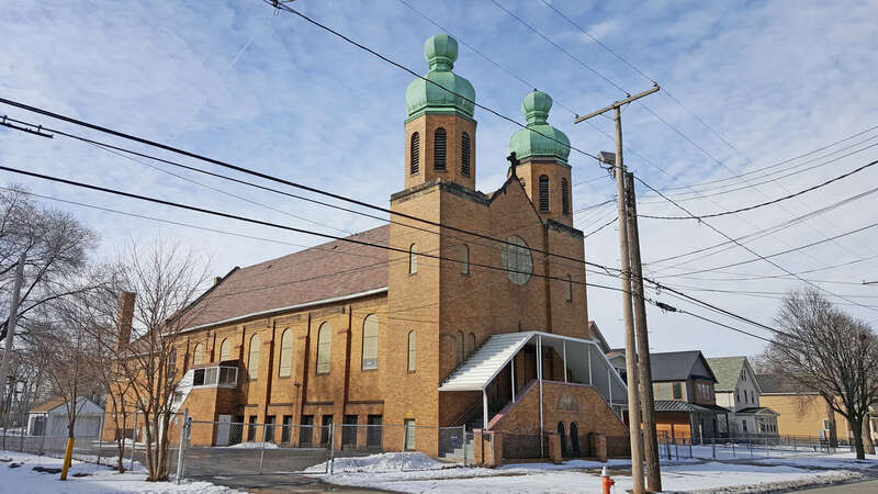 Southeast view of the main entrance and towers of St. Vladimir's Ukrainian Orthodox Church located at 2280 W. 11th Street in the Tremont neighborhood of Cleveland, Ohio, in the United States.
St. Vladimir's parish was founded in 1924 by immigrants