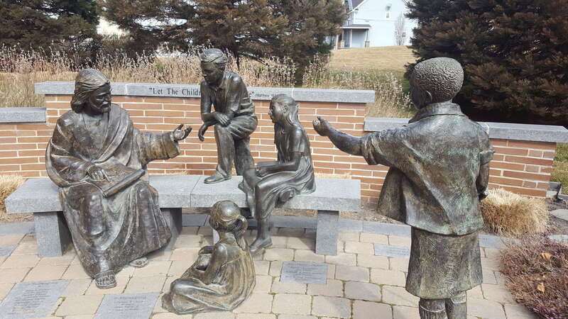 Statue of Jesus teaching the children at Saint John the Baptist Catholic Church in Draper Utah