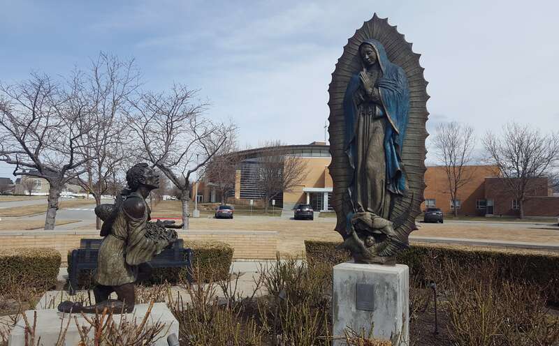 Statue of Our Lady of Guadalupe and Juan Diego at Juan Diego Catholic School in Draper Utah