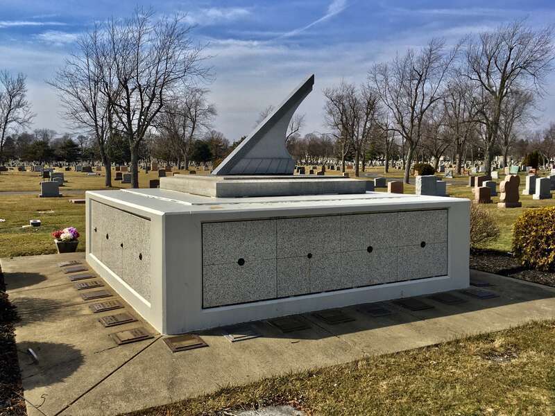 As seen in March 2021: a predominating presence in Section S of Buffalo Cemetery in Cheektowaga, New York, at the eastern extremity of the property near Harlem Road, is this sundial mausoleum containing space for the cremains of about 30 individuals.