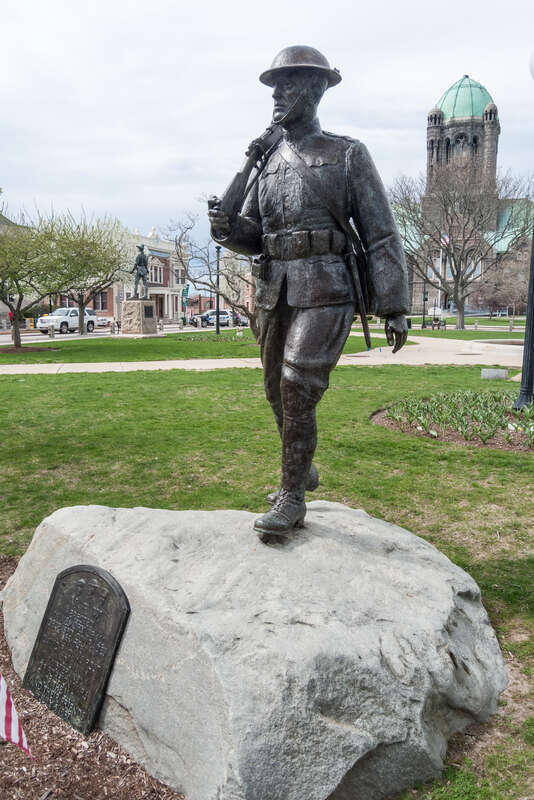 World War I &quot;Doughboy&quot; Statue Memorial on the south side of the Taunton Green. Massachusetts. &quot;Erected in memory of all deceased comrades by the David F. Adams Post No. 611 Veterans of foreign Wars of the U.S.A. and their friends July 5, 1937&quot;