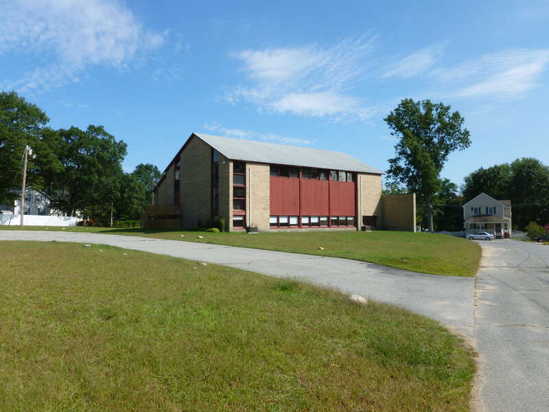 Temple Emanuel of the Merrimack Valley, a reform Jewish congregation located at 101 West Forest Street, Lowell, Massachusetts.  Northwest (back) and southwest sides of building shown.