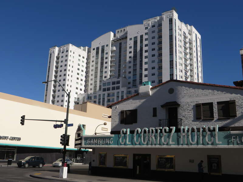 Looking northwest at the Ogden condominium tower in downtown Las Vegas, with a portion of the El Cortez hotel in the foreground.
