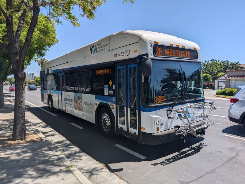 SCVTA bus number 7452, a Gillig Low Floor HEV, serving route 26 westbound at Campbell Ave and Union Ave in Campbell, California. The destination sign on the front reads &quot;26 WESTGATE&quot;.