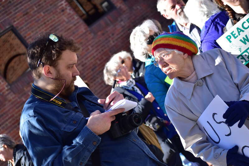 Over 50 people gather at Peace and Justice Plaza across the street from UNC-Chapel Hill to protest actions that might lead to a war with Iran.