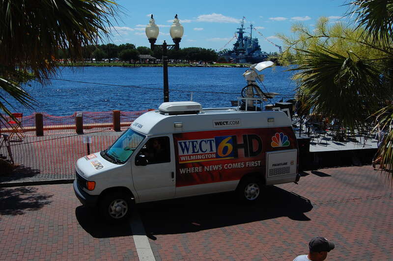 Hated to shoot into the sun this way but they were on the move so I did what I had to. Turned out, I was able to get the battleship USS North Carolina in the background on the other side of the Cape Fear as the van drove by.  This was on the
