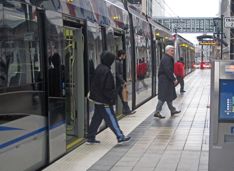 Noted Walkable Urban guru walking off Charlotte light Rail after a personal tour of station areas.
This work is licensed under a 
Creative Commons Attribution 3.0 United States License

Please Attribute to: Brett VA