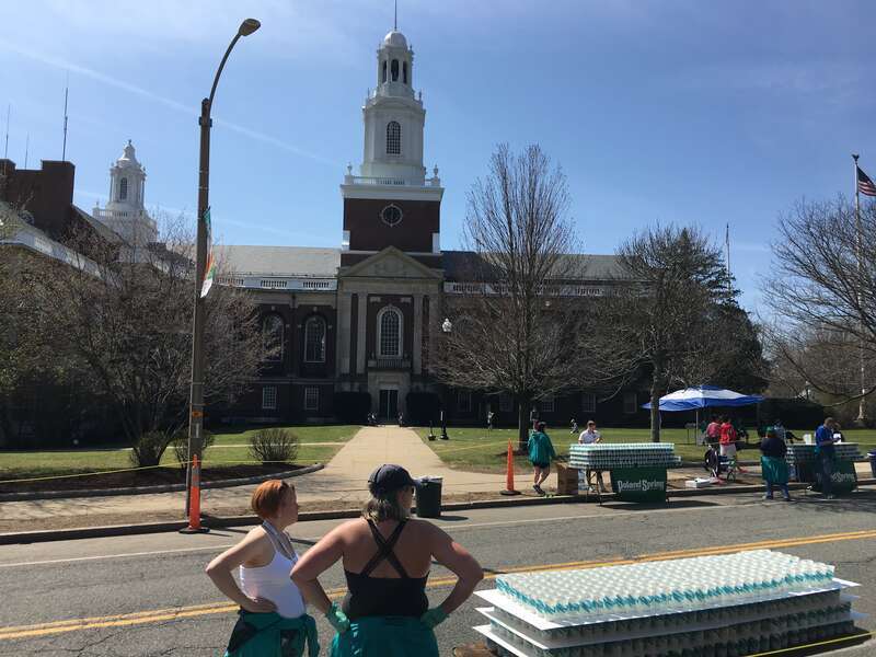 Cups of water ready for the runners at the start of the w:2016 Boston Marathon in front of Newton City Hall, w:Newton, Massachusetts.