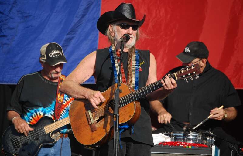 Willie Nelson in concert at Stockton's Banner Island Park. Willie was the followed by John Mellencamp and Bob Dylan.