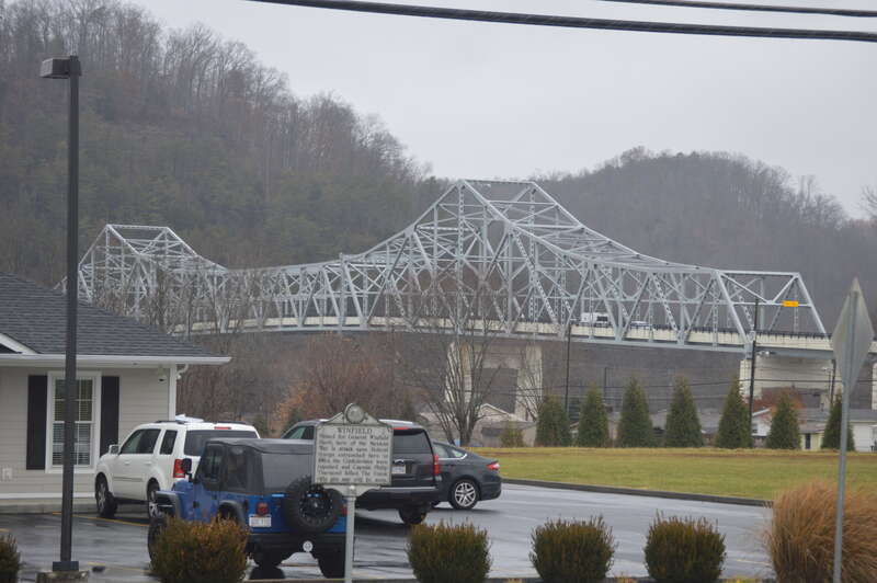 Distant view from the south of the Winfield Toll Bridge, which carries West Virginia Route 34 over the Kanawha River at Winfield, West Virginia, United States.  Built in 1955, it is listed on the National Register of Historic Places.