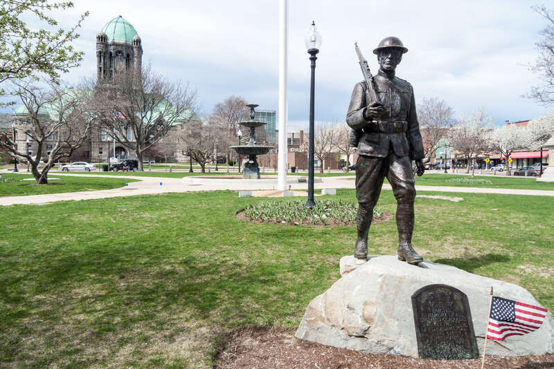 World War I &quot;Doughboy&quot; Statue Memorial on the south side of the Taunton Green. Massachusetts. &quot;Erected in memory of all deceased comrades by the David F. Adams Post No. 611 Veterans of foreign Wars of the U.S.A. and their friends July 5, 1937&quot;