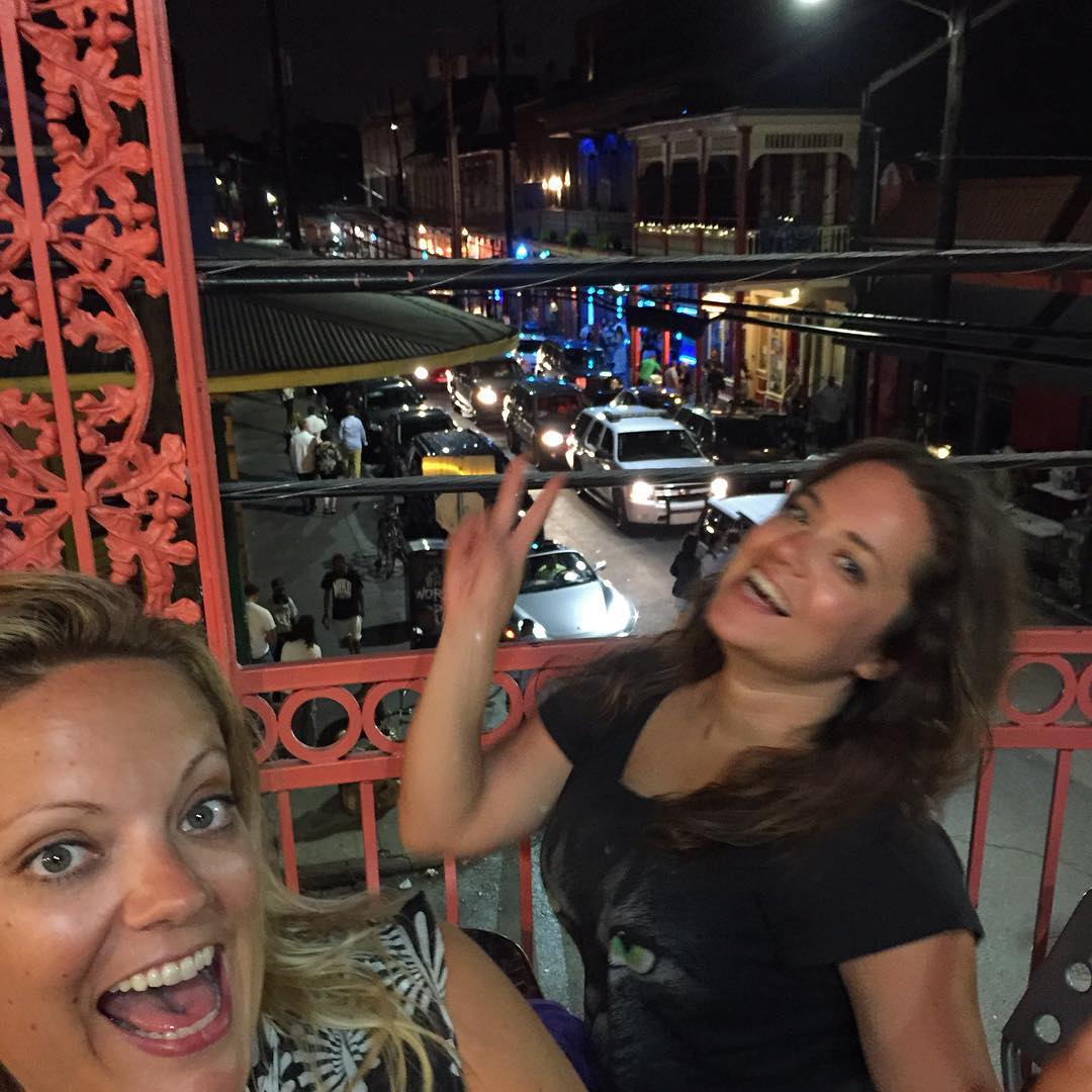 Frenchmen Street, New Orleans. Having fun on the balcony at Dat Dog.