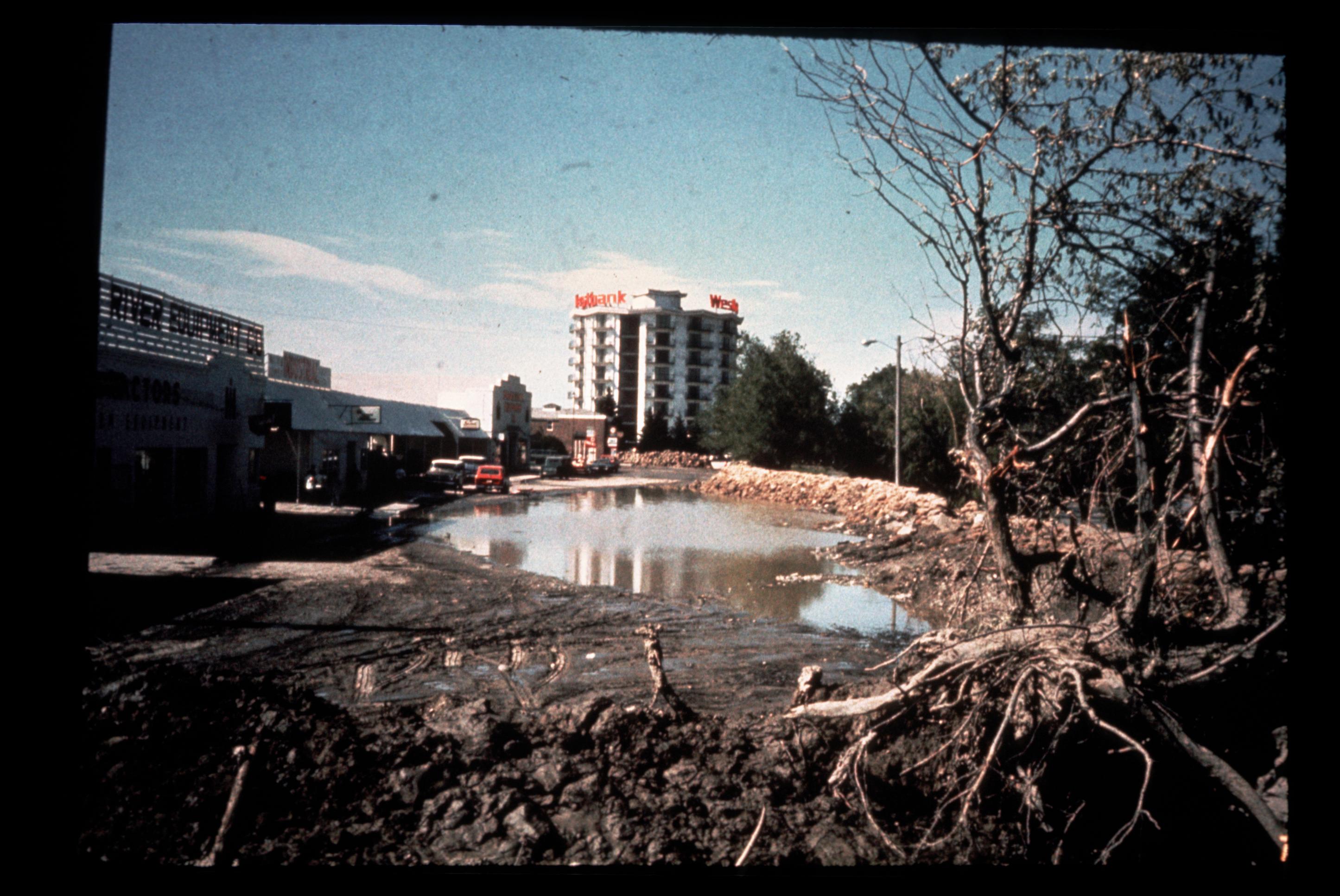 Image Title: Teton Dam Flood - Idaho Falls
Date: June 7, 1976
Place: Idaho Falls, Idaho
Description/Caption:
Medium: color transparency
Photographer/Maker: Unknown
Cite as: ID-L-0061, WaterArchives.org

Restrictions: There are no known U.S. copyright