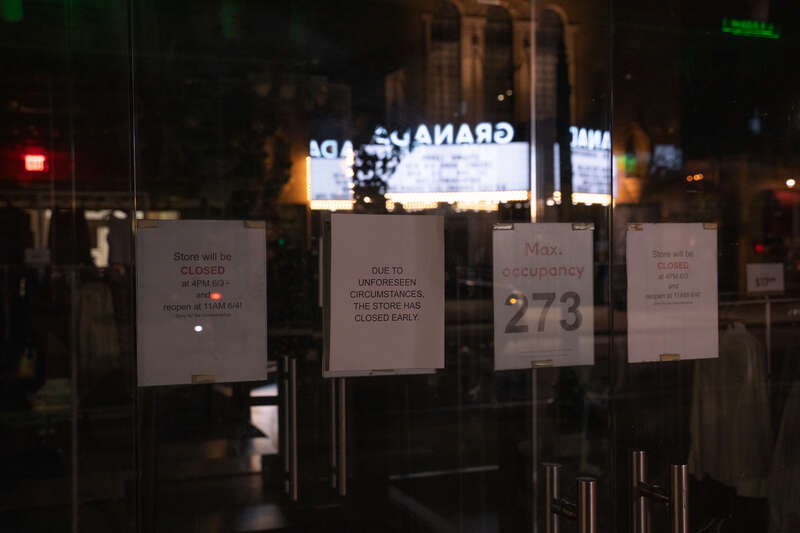 Signs on H&amp;amp;M after Winston Smith was killed by law enforcement the day before a block away. Stores closed early over potential unrest in the area,