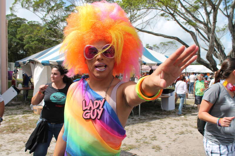 Folks dancing to DJ ____ at Tea Dance Stage at South Florida Pridefest at Holiday Park in Fort Lauderdale, FL on Sunday afternoon, 11 March 2012 by Elvert Barnes Photography
