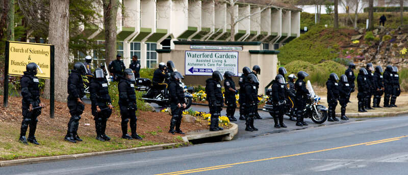 Line of police in riot gear at anti-Scientology protest in Atlanta, GA.