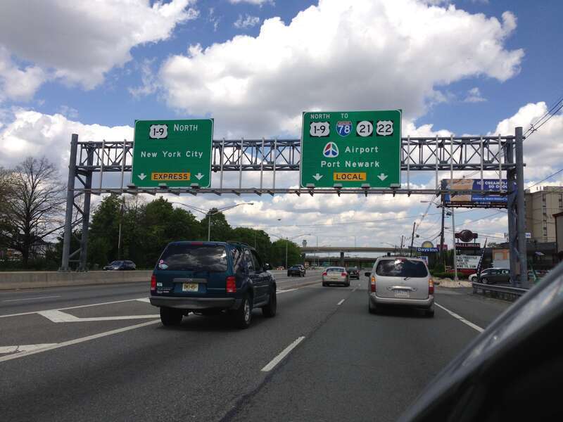 Signs along Spring Street (U.S. Route 1 and U.S. Route 9) northbound near North Avenue in Elizabeth, New Jersey