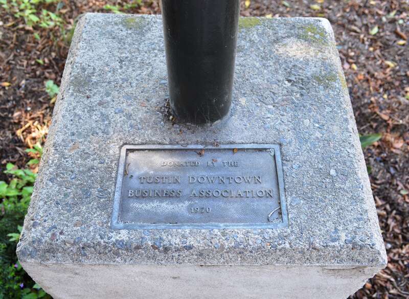 Plaque for the El Camino Real bell on the southeast corner of El Camino Real and Main Street in Old Town Tustin.