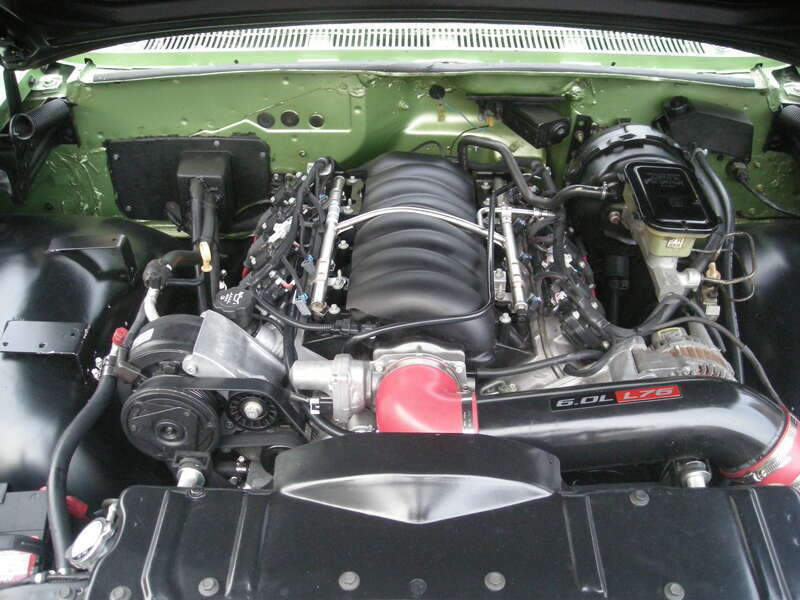 A 1959 Chevrolet El Camino engine at the 2014 Rolling Sculpture Car Show in Ann Arbor, Michigan (United States).