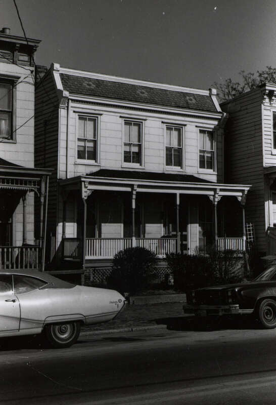 Address/Title: 208 West Leigh Street
Photographer: Zehmer, John G. (John Granderson), 1942-
Original Description (from Book): This house is larger than its neighbors and appears to date from the turn of the century. The small mansarded roof is
