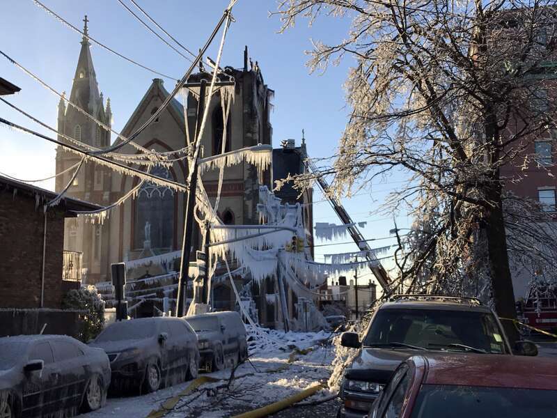 Looking west on 14th Street from near the corner of Central Avenue in Union City, New Jersey, in the late afternoon of March 4, 2017. Pictured is the remains of SS. Joseph and Michael Parish Church, to which a fire that started around 1am EST at 1404