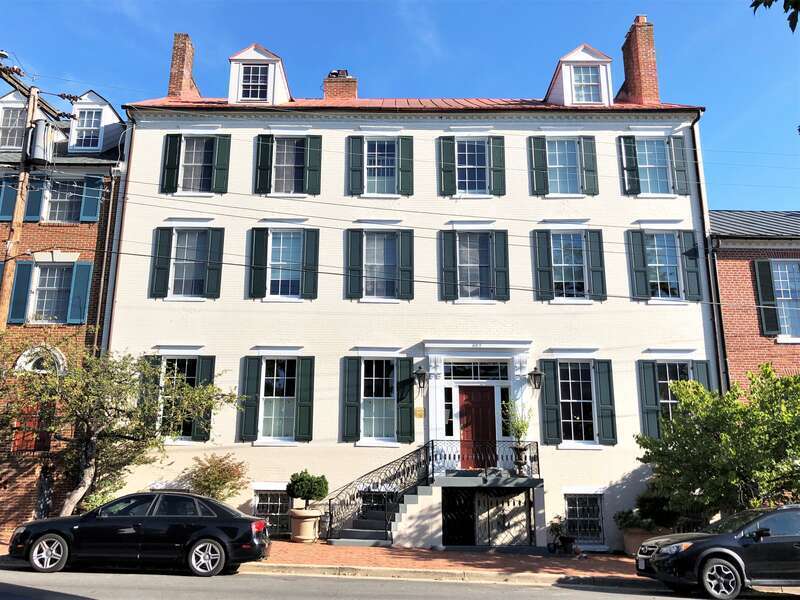 A firemark on 523 Queen Street' between North St. Asaph and North Washington Streets in Old Town Alexandria, Virginia.