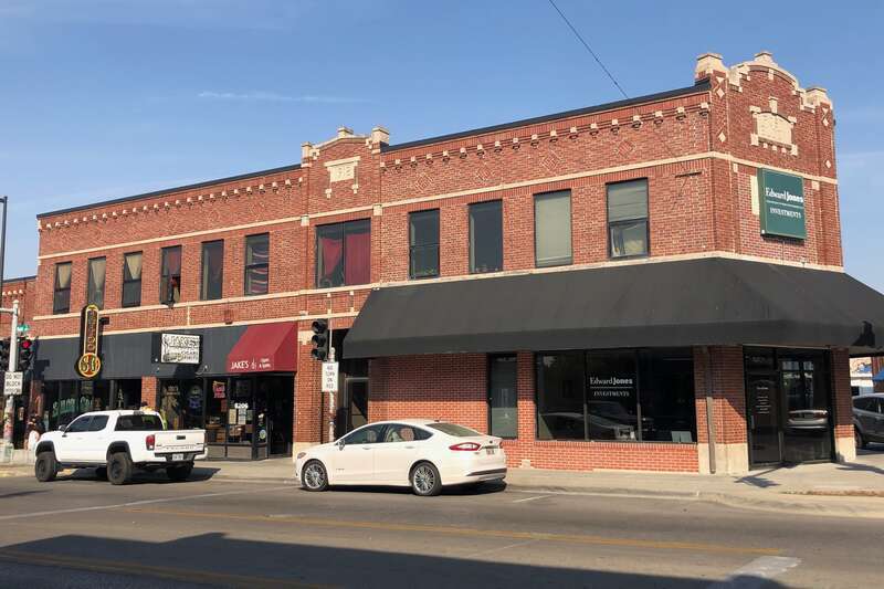 The B.H Post Block is complex two-story brick commercial block with a flat roof and irregular plan.