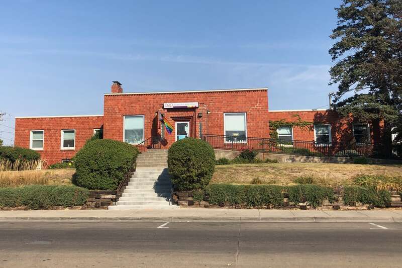 The Benson Medical Center is a free-standing brick building with a roughly cruciform plan.