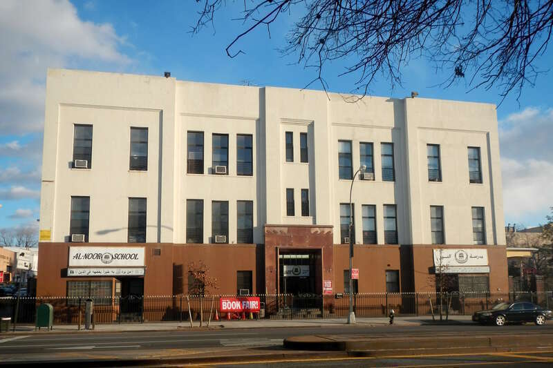 Looking southeast across 4th Avenue at school on a sunny winter afternoon.