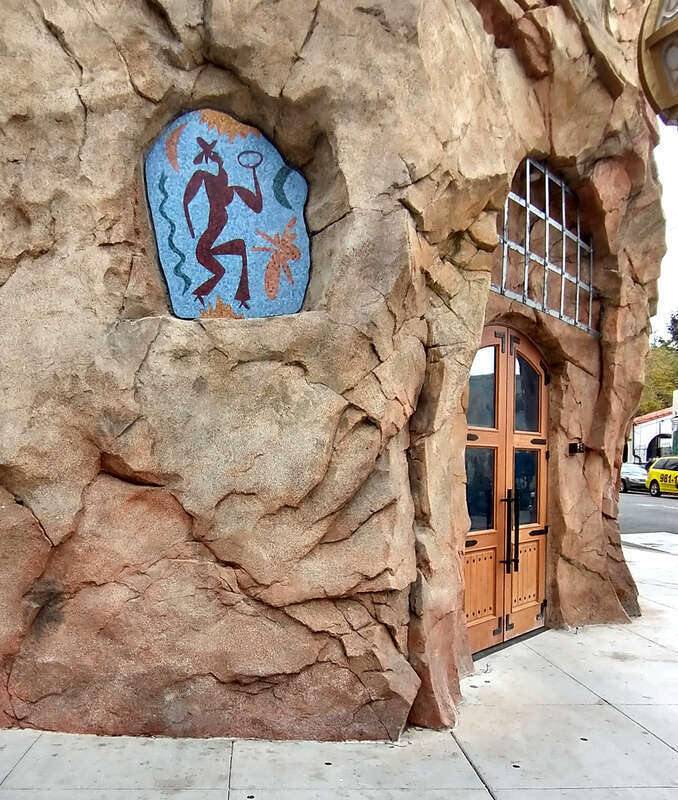 Art in niche on fake stone (plaster over metal wire,rebar, and metal stud frame)