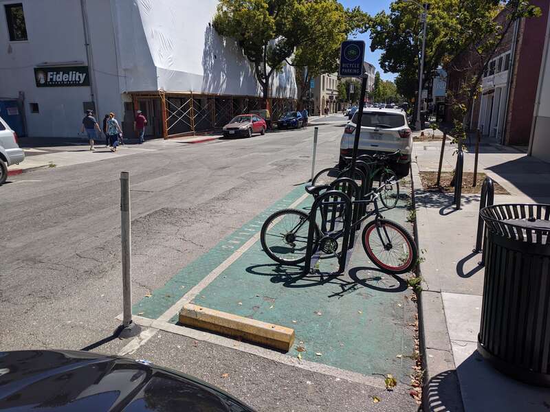 A car parking stall converted to park bikes on Ramona Street in Palo Alto, California.