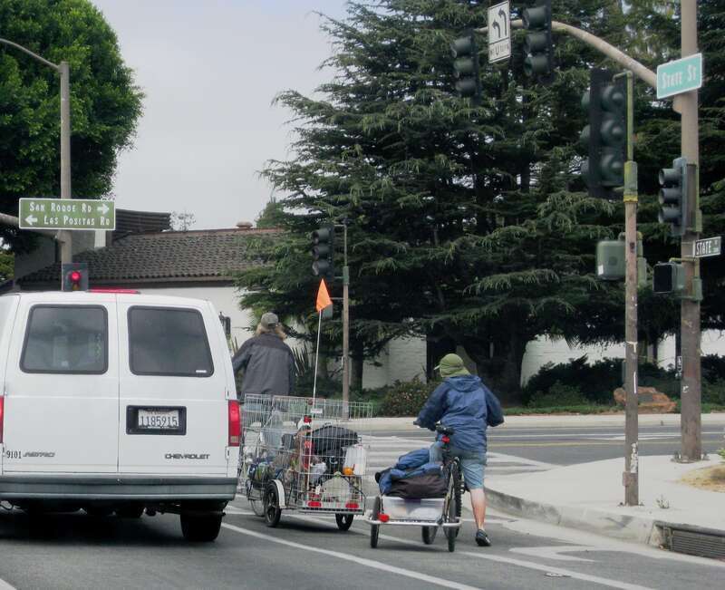 I saw these folks at a red light, pretty serious bikers - but no helmets. Being from the Pacific Northwest, I was a little surprised at their jackets - since it was above 20 (68 F), That's T-shirt weather in Seattle.

sb0811 137