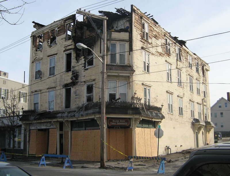 Picture of historical building, erected in 1889, on Bridge Street, Lowell, Massachusetts, United States, shortly after it burned in the early morning of 2010-02-12.