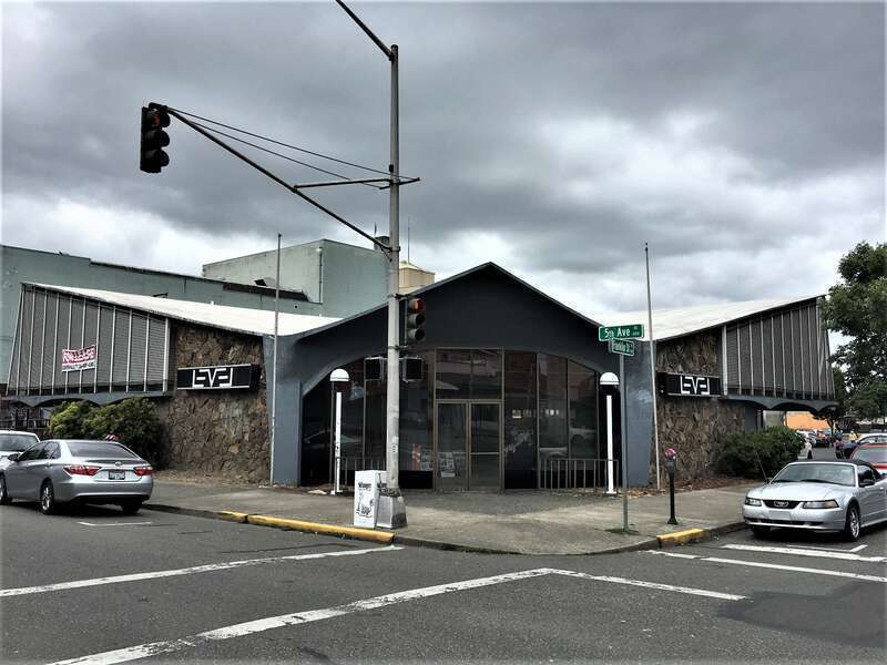 Capital Savings and Loan Association  Asymmetrical Googie structure is currently vacant and was most recently a nightclub.  East-southeast view.