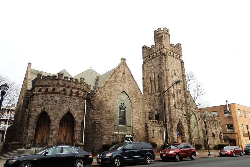 Looking east at church on a mostly cloudy afternoon