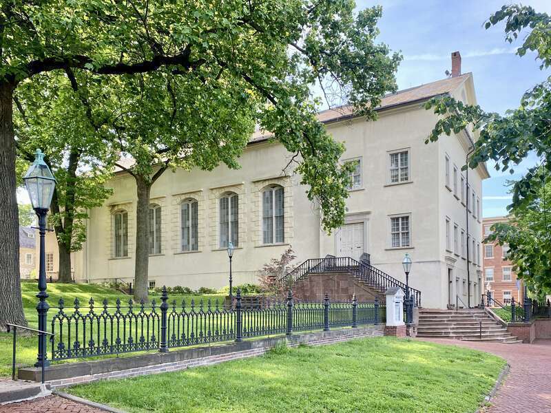 Built between 1803 and 1806, this Classical Revival-style church was built to serve the Moravian community in Bethlehem, which settled in the area during the mid-18th Century.  The building features a simple stucco-clad exterior with six-over-six and