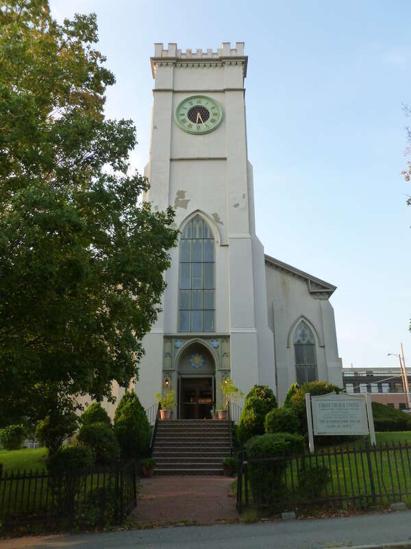 Christ Church United, a church located at 180 East Merrimack Street, Lowell, Massachusetts.  South (front) side of building shown.
