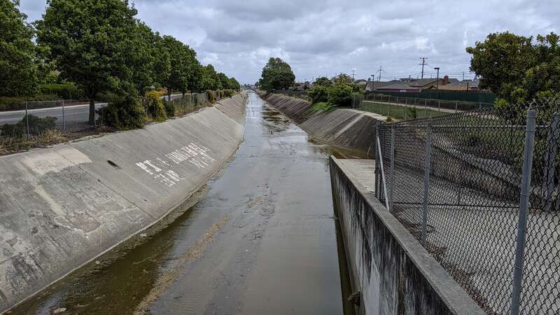 Colma Creek below Orange Memorial Park landscape, looking southeast