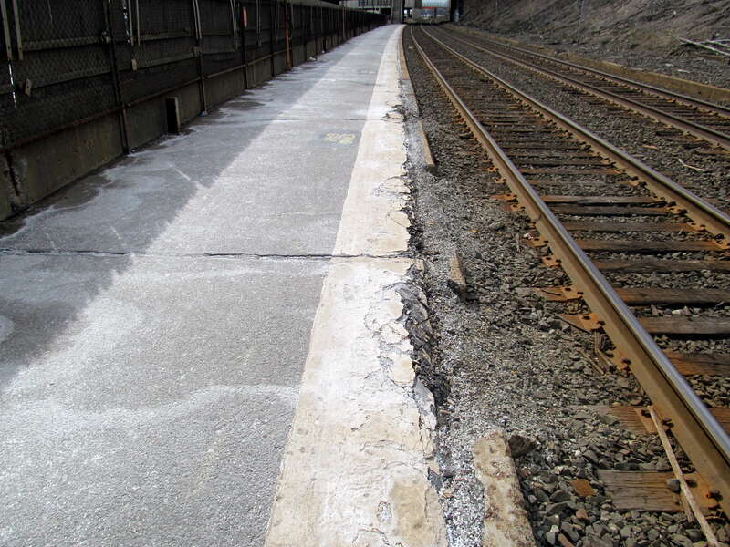 The platform edge crumbling at Newtonville station in March 2013