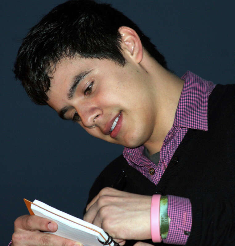 David Archuleta signing autographs while serving as Grand Marshal in the Krewe of Caesar Mardi Gras parade in Metairie, Louisiana (near New Orleans) on February 14, 2009.